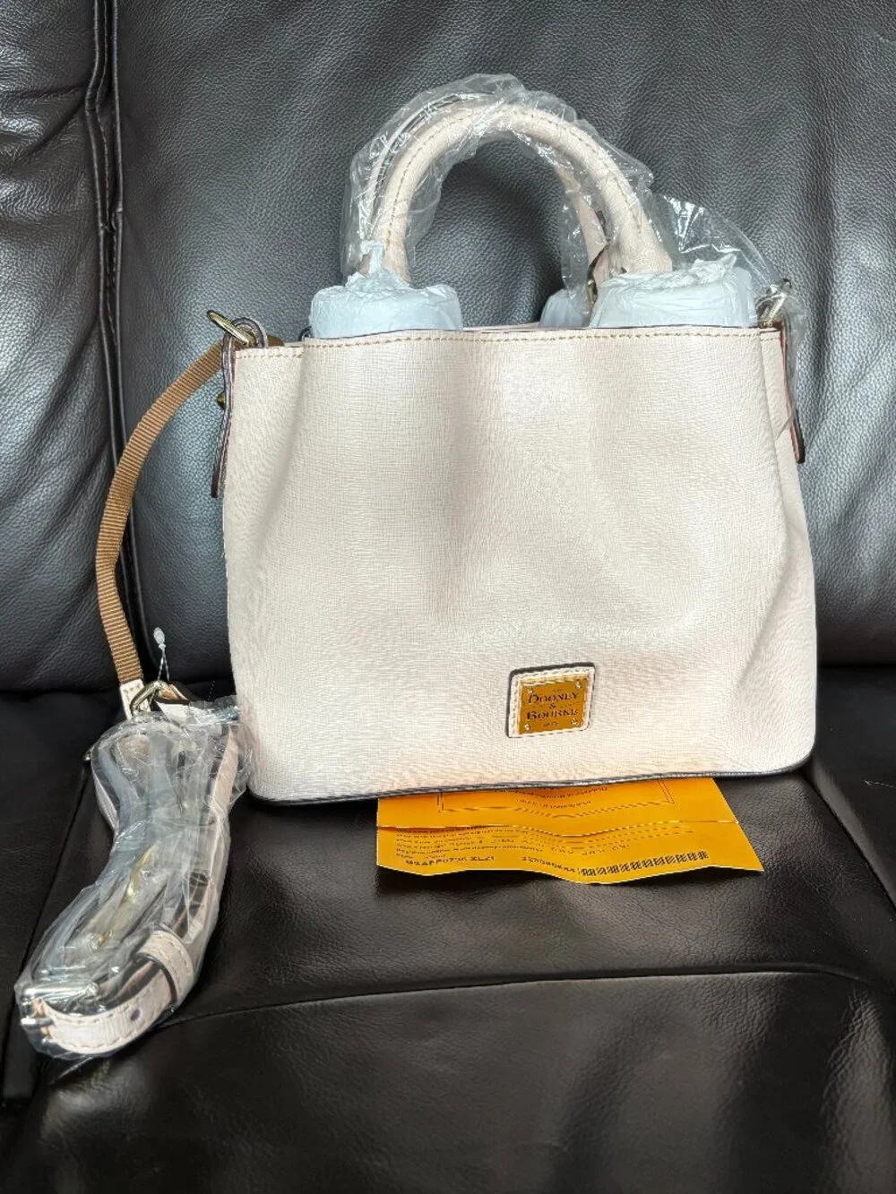 NWT Dooney and Bourke Mini Barlow in Blush, incl strap, registration, dust bag